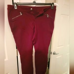 Tight button up legging like pants. Torrid size 14. Maroon/purplish color.